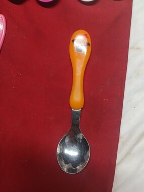Horizon Group Orange Handle Boy Witch Design Baby Spoon